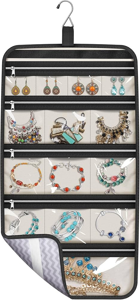 MISSLO Hanging Jewelry Organizer Travel Foldable Jewelry Roll Storage Case with 14 Cotton Zippere... | Amazon (US)