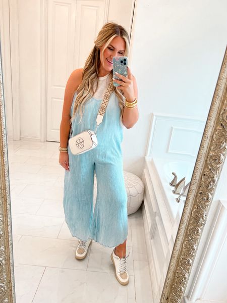 Most comfortable jumpsuit ever! I love that this piece feels like pjs but looks like a free people dupe! You are going to love the price point too! Available In multiple colors and runs tts. Wearing a medium. 

#LTKtravel #LTKstyletip