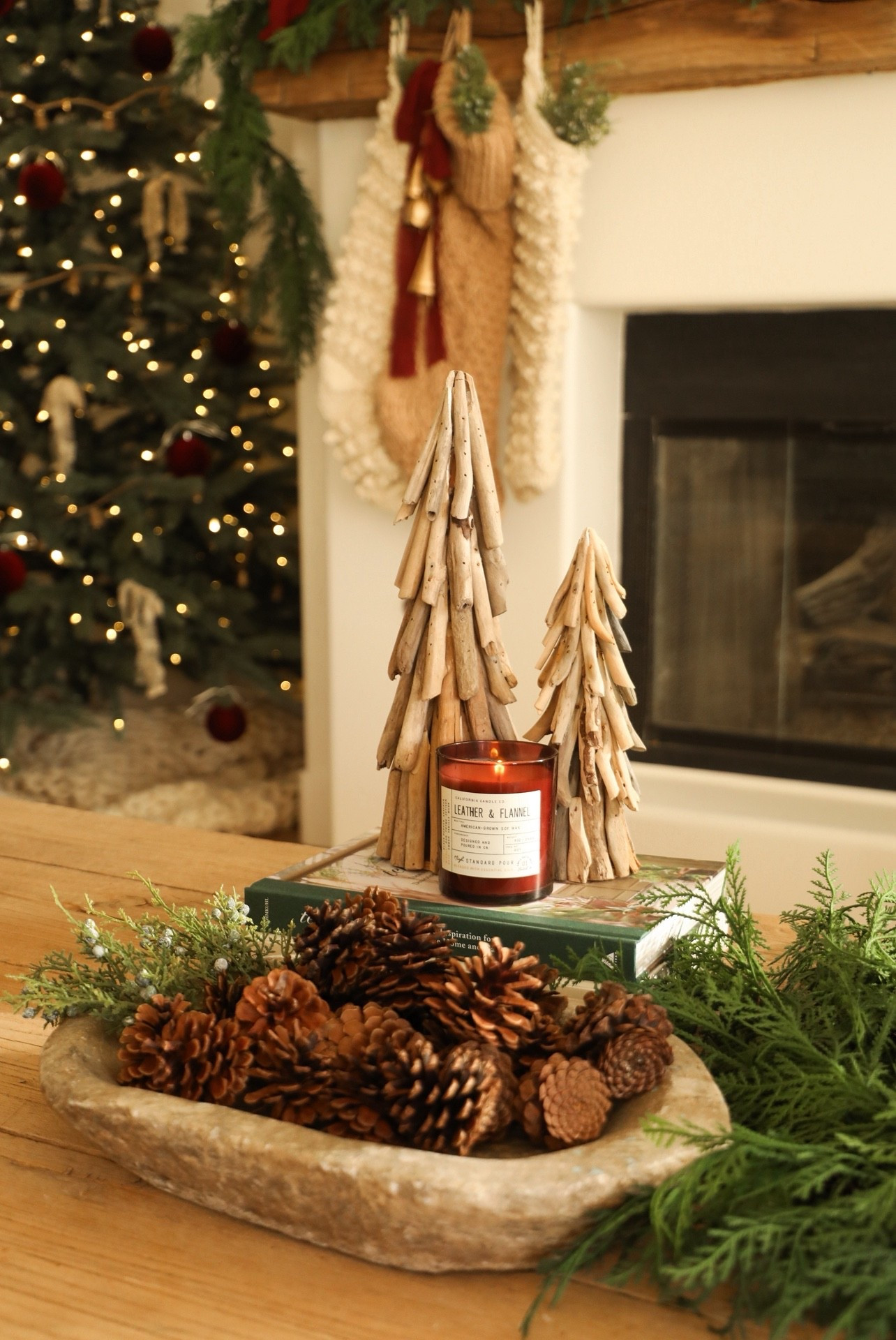 Cozy coffee table styling for Christmas #ltkhome #holidaydecor #christmasdecor #decor #christmasdecorations 

#LTKHome #LTKHoliday #LTKSeasonal