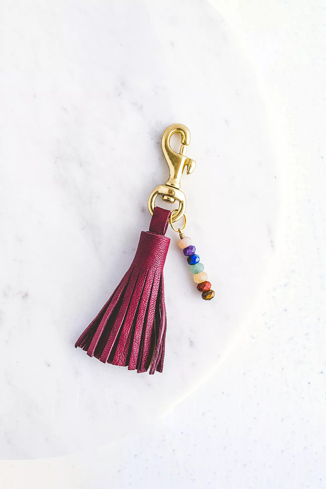 Giving Bracelets Chakra Gemstone Leather Tassel Keychain | Free People (Global - UK&FR Excluded)