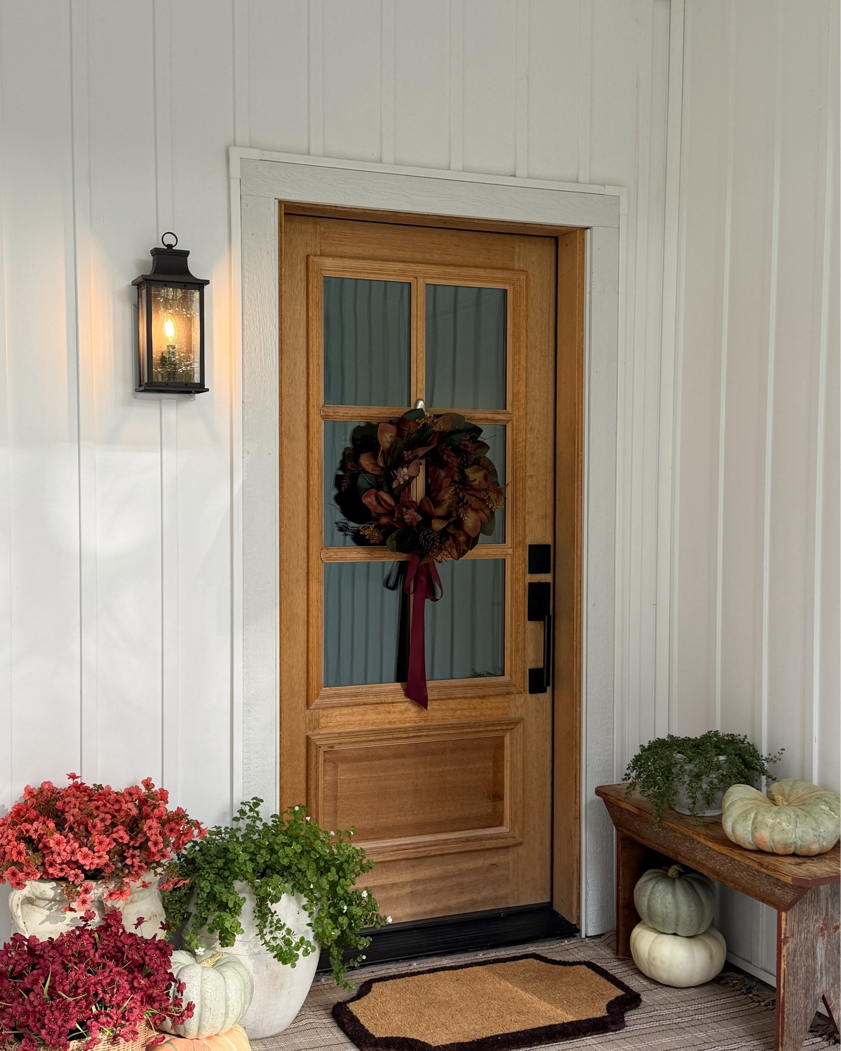 Our fall front porch 🤎🍂 A layered doormat, a few pumpkins, some faux fall florals (the greenery is real bacopa I had potted this summer!), and the cutest little vintage bench I found on FBMP this week! I love how cozy it all feels out here 🤎

#LTKSeasonal #LTKHome