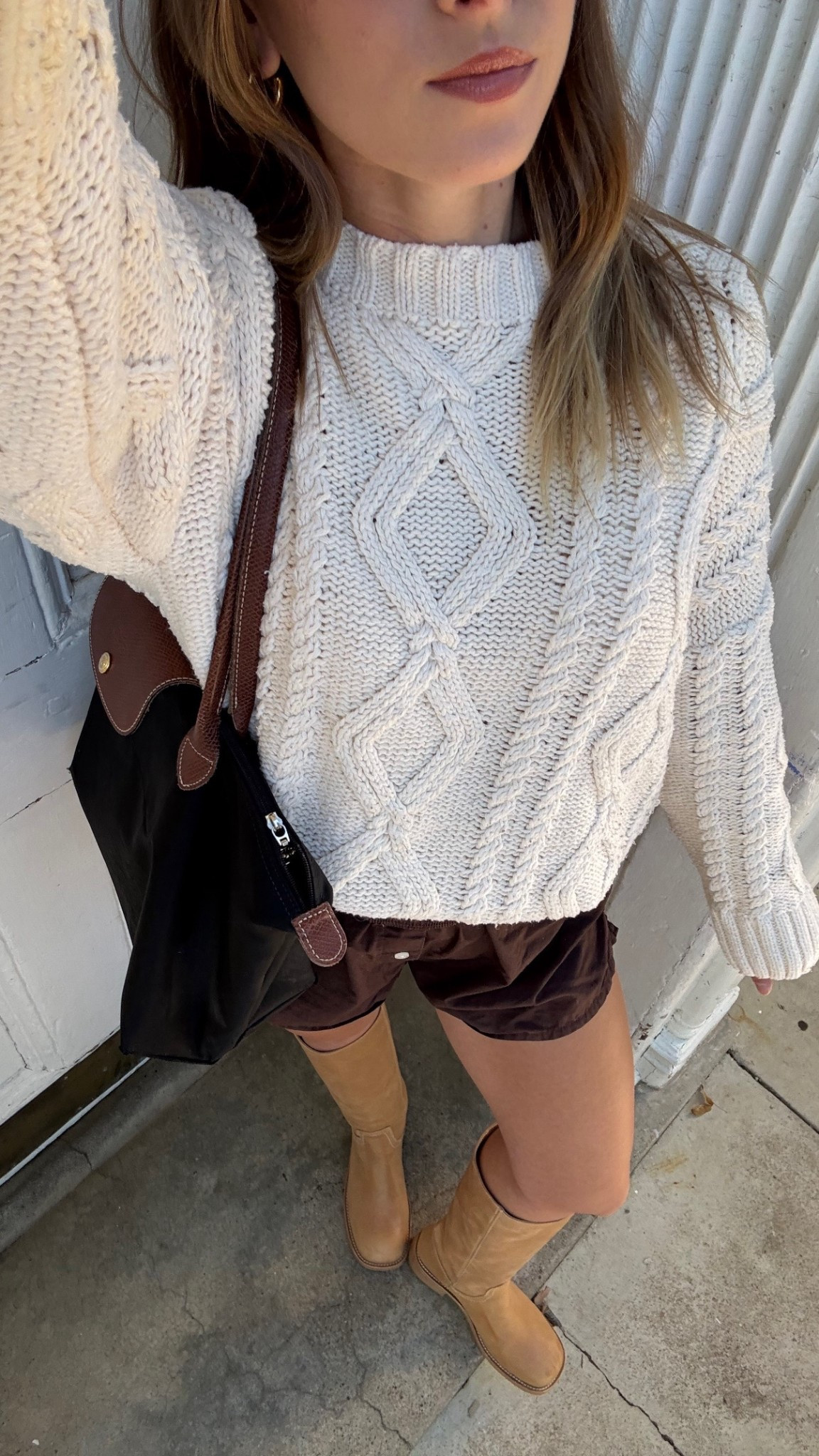 8/26/25 The perfect summer → fall outfit for a 70° day 🍂🤍 Wearing my oversized cable knit sweater from Princess Polly with my Aritzia brown boxer shorts + my Frye-inspired boots from Steve Madden. Cozy on top, easy + breezy on the bottom — my go-to transitional uniform.



#LTKShoeCrush #LTKStyleTip