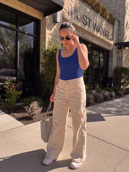 Obsessed with these lightweight cargo pants for spring outfits! Wearing a size 4 and they fit perfectly loose. Blue bodysuit is actually a one-piece swimsuit (S). 

#LTKswim #LTKSeasonal #LTKstyletip