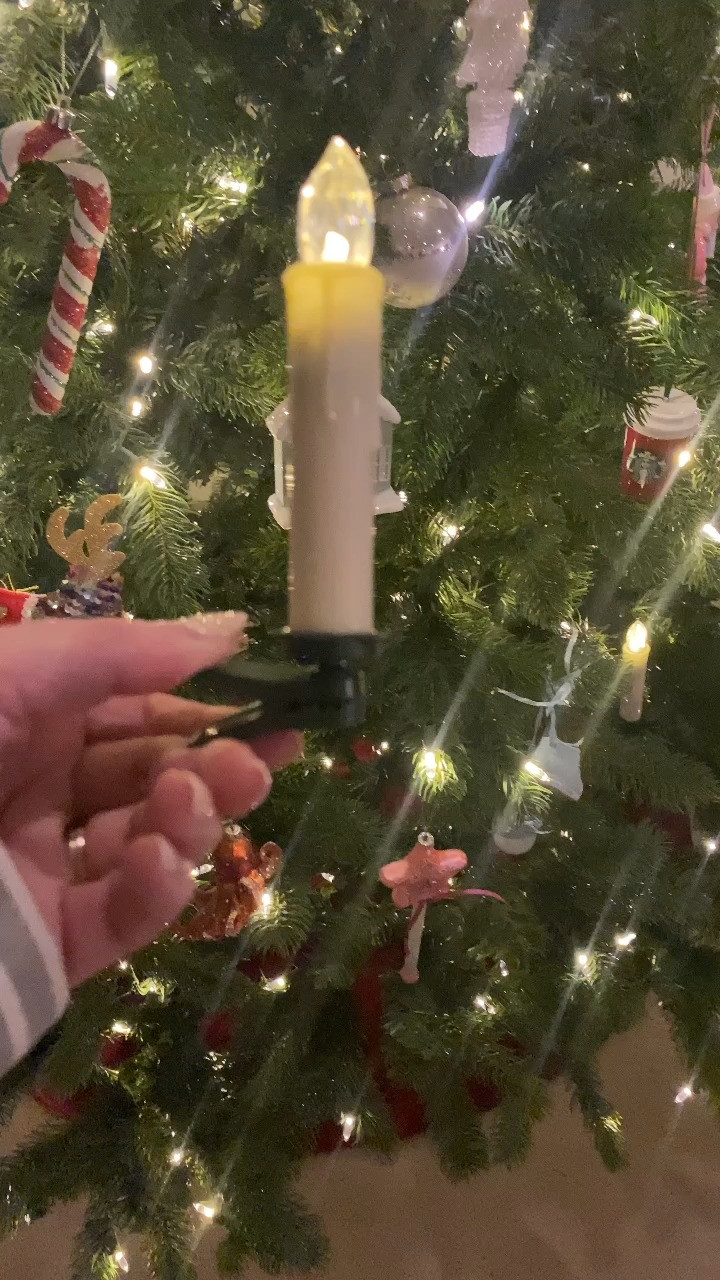 Putting the finishing touches on the tree to get that warm Christmas glow! #Christmastree #Christmasornaments #velvetbows #candles #Christmastreeornaments #Christmascandles #Christmasbows 

 #LTKHoliday #LTKSeasonal #LTKHome
