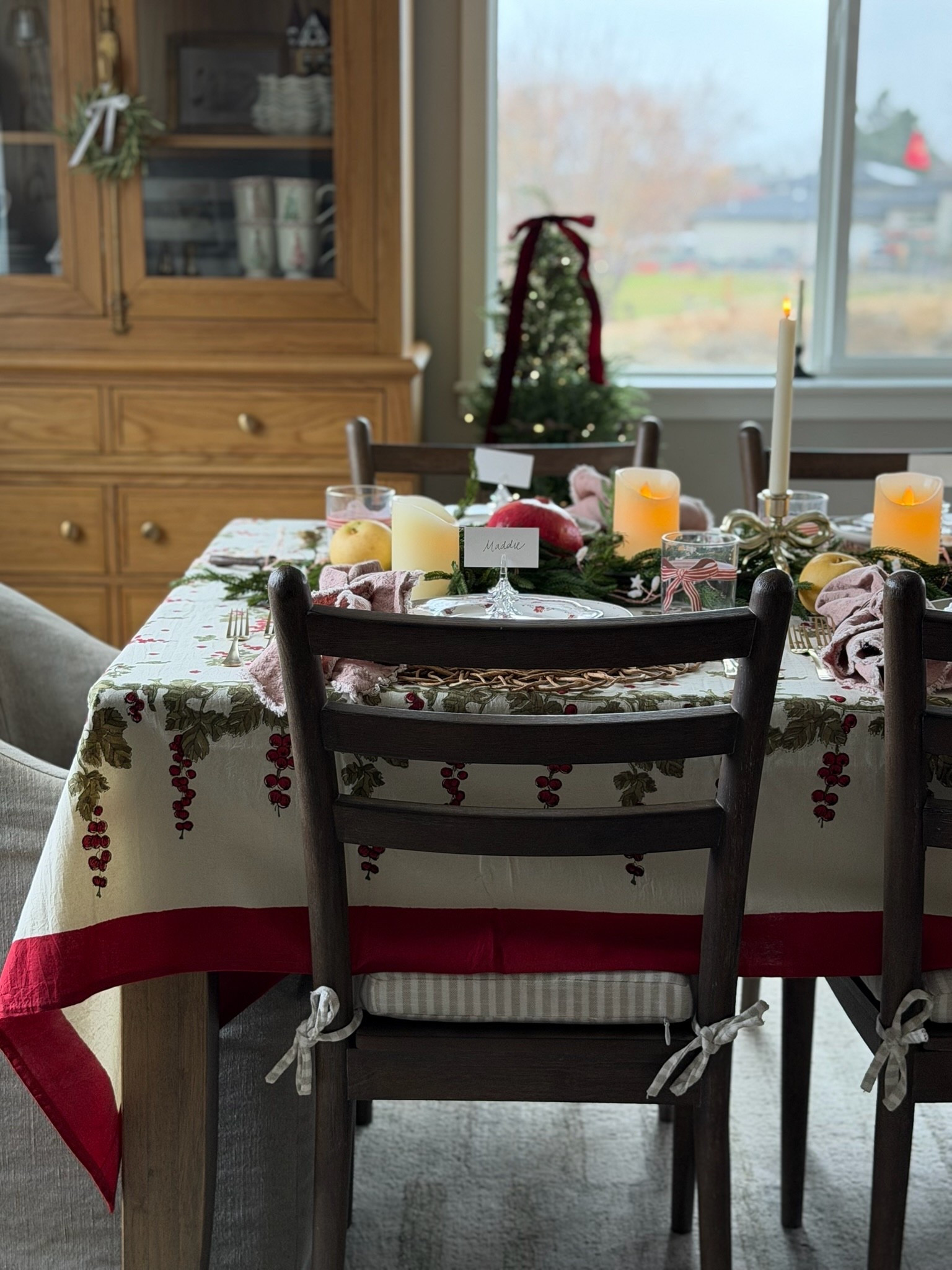 This gorgeous tablecloth might be my favorite part of this whole Tablescape! I love the gorgeous red berries and border. Timeless, a little bit traditional, and oh so cute!

#LTKHome #LTKHoliday