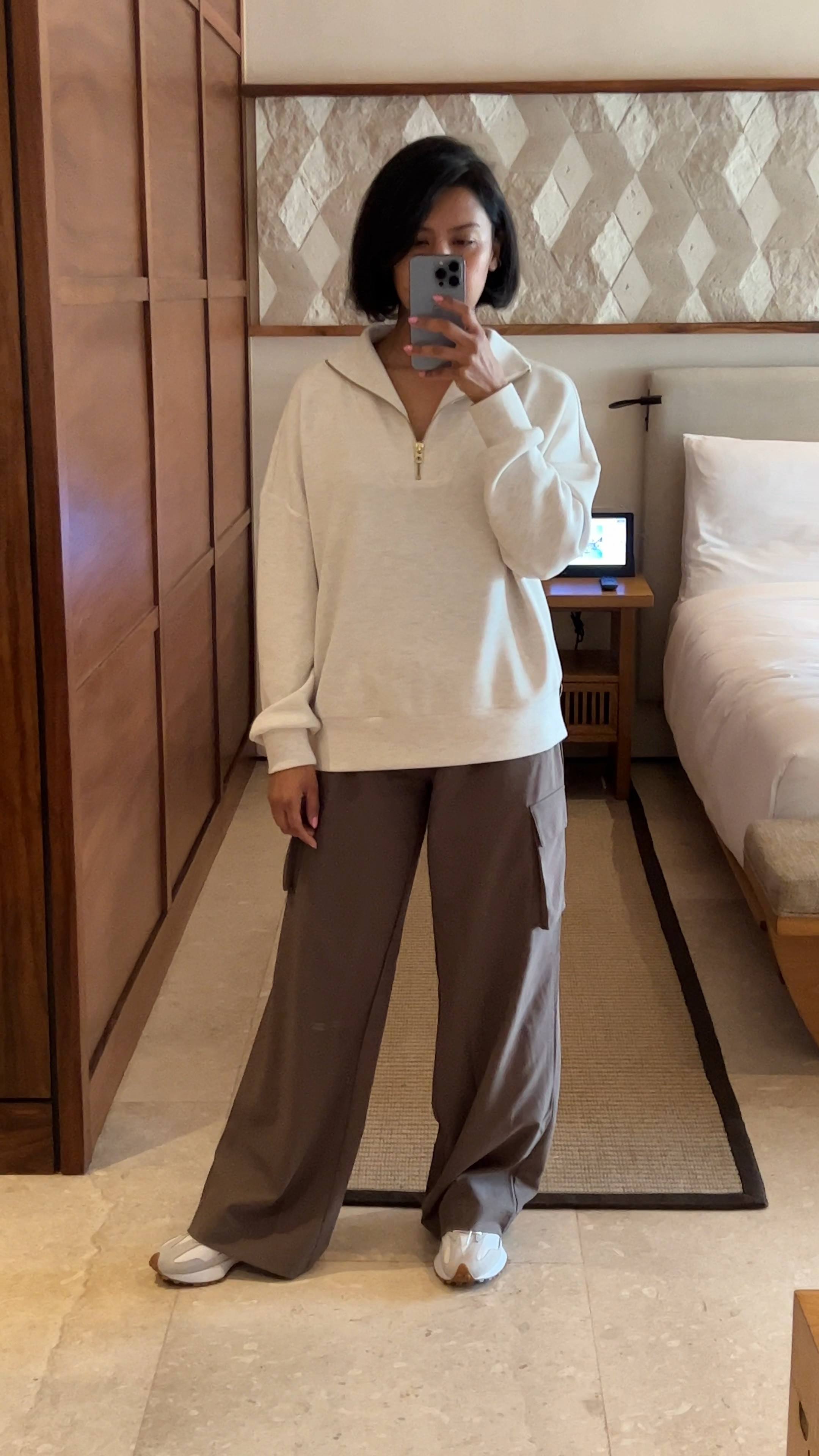 Oh my gosh, this whole outfit is seriously comfy! I slipped into this half-zip pullover or sweatshirt, and it was like getting a big ol' hug! It's just ridiculously cozy and stylish all rolled into one. I’m hooked! I grabbed the ivory one, but man, their mushroom color looks yummy too!

I paired the top with these wide-leg, relaxed pants. They've got an elastic waist inside, which is awesome! And those deep cargo pockets? Love the look!

Oh, one more thing, they do seem to run a bit long. You could totally get them hemmed if you want, or if you're like me and dig that relaxed look, just rock 'em as they are! 

#LTKStyleTip

#LTKOver40 #LTKootd #LTKTravel