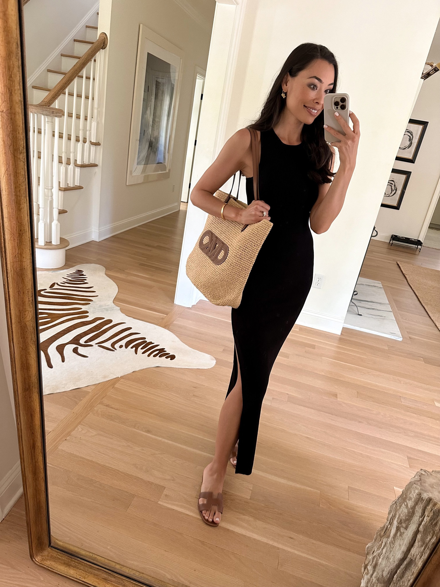 Kat Jamieson wears a black ribbed knit dress and raffia tote bag from @michaelkors. Shop the summer style event and get 25% off your purchase! #michaelkors mkpartner

#LTKSeasonal #LTKSaleAlert #LTKItBag