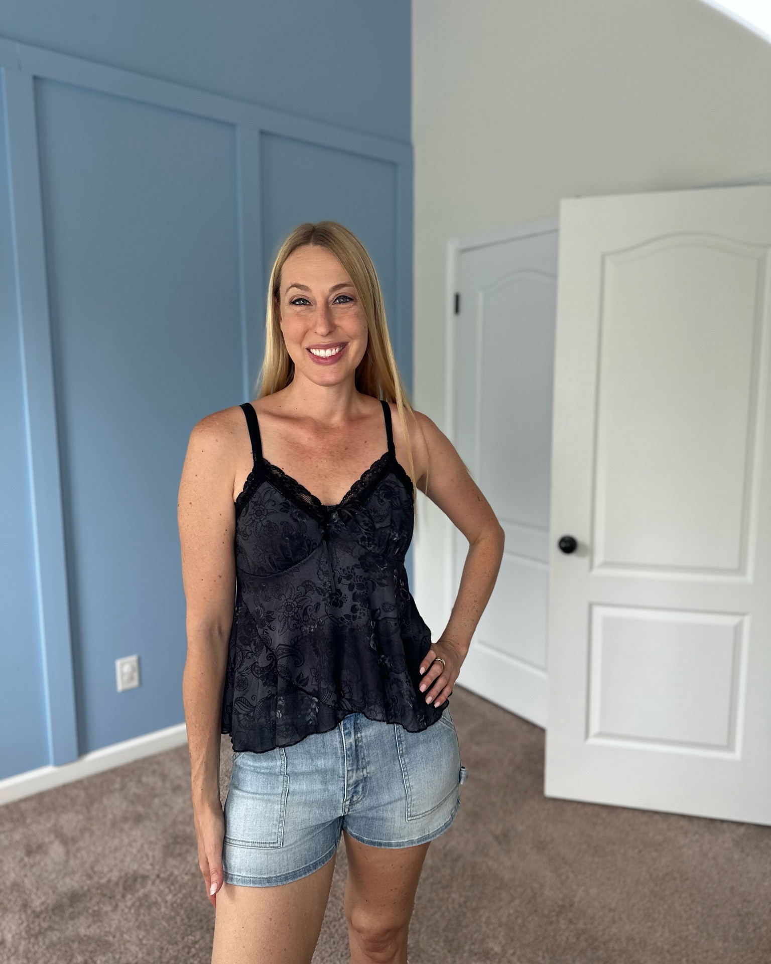 Dark floral summer cami
It has a lot of flowy space in it and super comfy 
Wearing small, fits tts