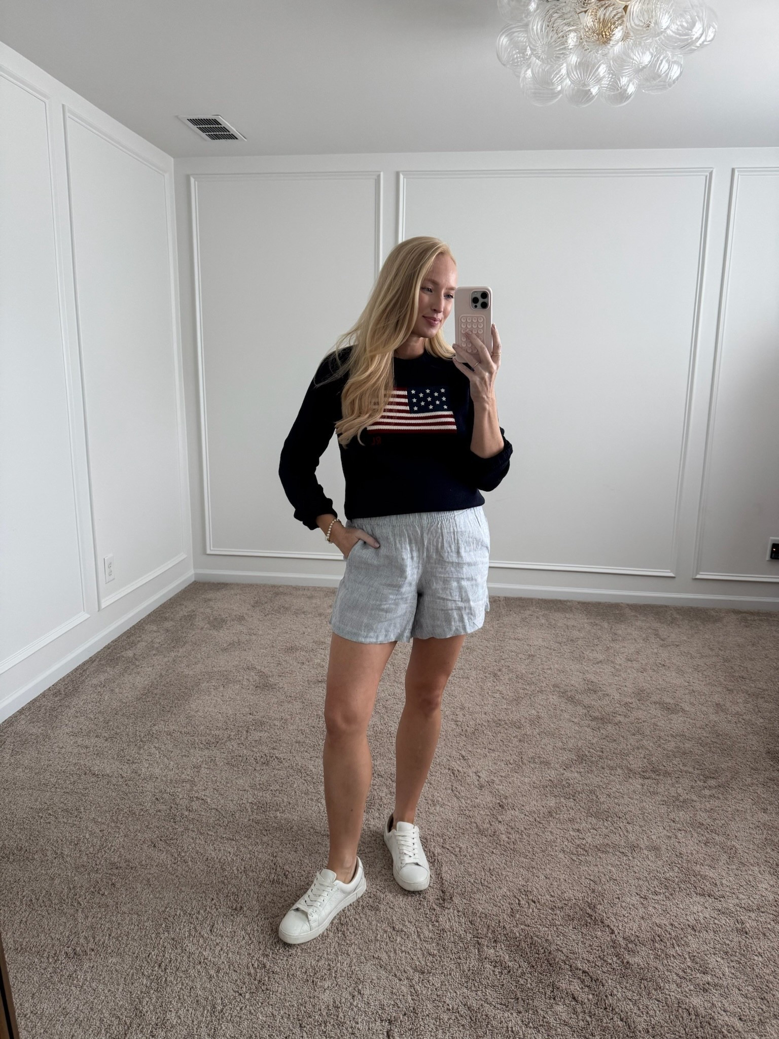 Casual 4th of July look! Summer outfits // summer sweaters // patriotic sweaters // summer shorts // linen shorts // 4th of July outfits // casual outfits // white sneakers // bump friendly shorts 

#LTKBump #LTKSeasonal #LTKSummerEdit