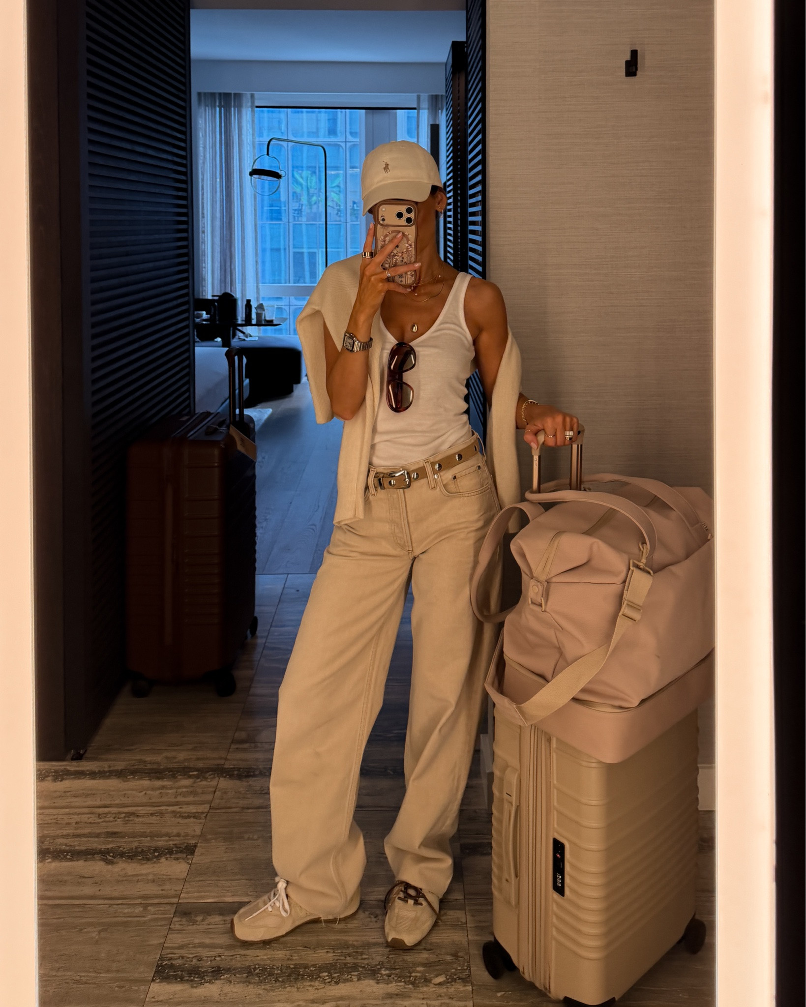 Airport outfit - Agolde jeans (so cool, mid rise, oversized fit/25) @Zara  tank and @Vuori US  cashmere crew neck! As always my @beistravel luggage started set (super roomy and chic)

#LTKgrwm #LTKootd #LTKTravel