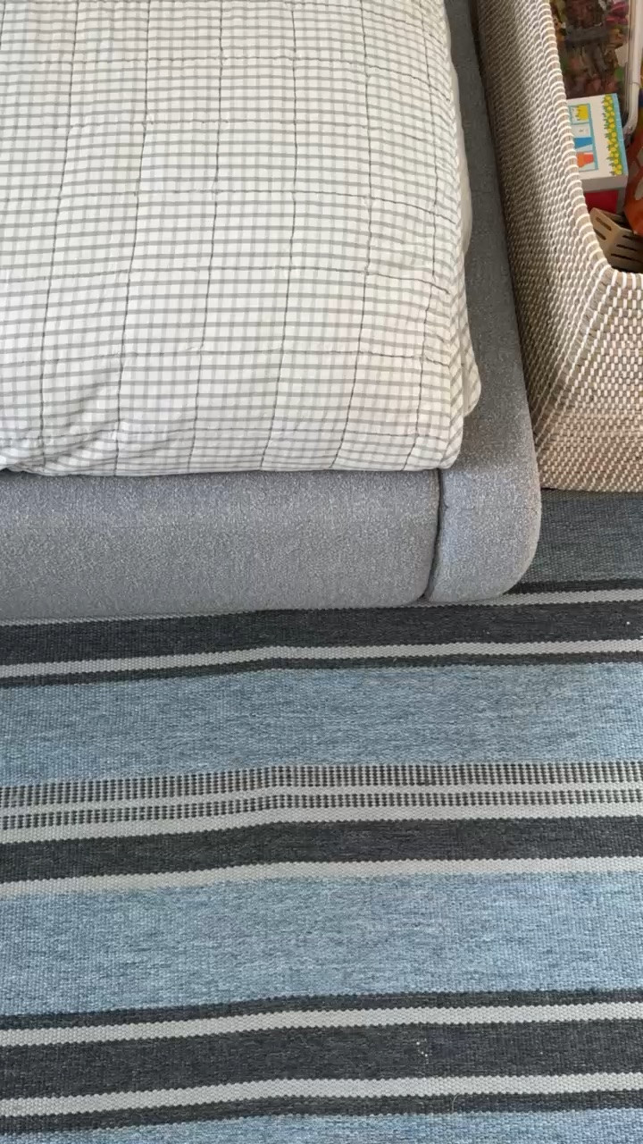 This blue striped rug is such a beautiful way to bring color and pattern into a room without overwhelming the space. I love the classic stripes and soft blue tones that work beautifully with warm wood furniture and neutral decor. Such a timeless piece that can grow with a boys’ bedroom over the years.

blue striped rug, boys bedroom rug, blue area rug, striped area rug, kids room decor, boys bedroom inspiration, coastal bedroom decor, patterned rug, timeless kids room, blue and white decor, bedroom styling ideas, girlonthehudson