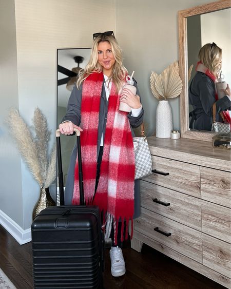 Travel outfit: Abercrombie gray trench coat, red plaid yllw the label scarf, spanx air essentials pullover, Abercrombie black joggers, Beis luggage, Nike Air Force 1s, BKR water bottle, anine bing sunglasses