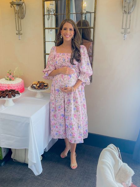 The perfect dress for a baby girl baby shower! The flowy, elegant look of this midi dress is simply perfect. This dress features a smock stretch bodice, puff sleeves, built in waist tie, and functional pockets.

#LTKunder100 #LTKSeasonal #LTKbump