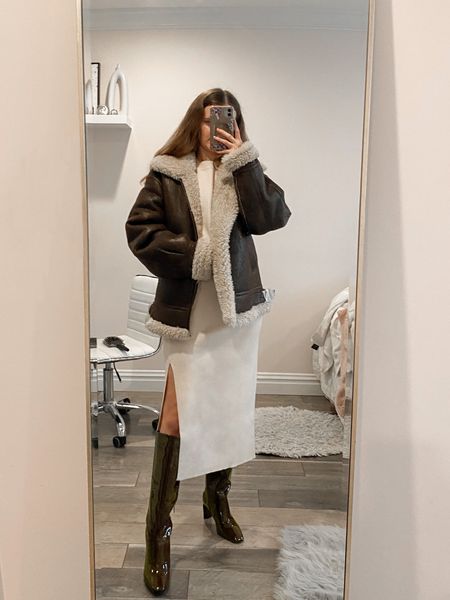 A shearling jacket is the perfect cozy winter jacket to style with your  winter outfits. Pair with a midi ribbed skirt set or dress and knee high boots. Or it’s also cute paired with a pair of straight leg white jeans and a basic bodysuit top.
.
.
.
.
.
.
.

 brown jacket | faux fur jacket | Sherpa moto jacket | aviator jacket | faux leather moto jacket | ribbed set | skirt and sweater | skirt outfits | skirt and boots | skirt sweater set | midi skirt outfit | winter skirt outfit | knit skirt set | sweater outfits | winter boots | boots 2023 | knee high boots outfit | brown boots | bodysuit outfit | winter fashion | outfit ideas | outfit inspo | date night outfits | white sweater | cream sweater 

#LTKGiftGuide #LTKSeasonal #LTKFind #LTKunder50 #LTKunder100 #LTKHoliday #LTKU #LTKsalealert #LTKfindsunder50 #LTKfindsunder100 #LTKstyletip #LTKworkwear #LTKtravel #LTKshoecrush #LTKitbag 