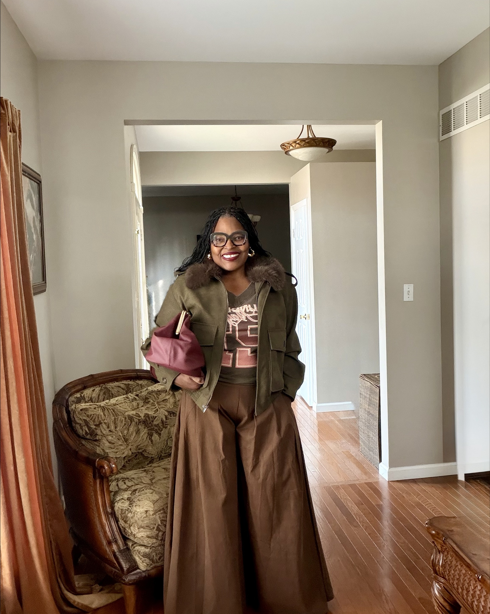 FALL MUST HAVE!!
The wide leg trousers are one of my must haves  for fall, especially in this beautiful brown color!! These trousers screams FALL FASHION coupled with the faux fur trimmed bomber, kisslock bag, graphic T-shirt and over the knee boots!! Wearing what I love!!  I shared some great options for those pieces that were not available! If you want more information regarding sizing just comment “fall fashion”

#LTKgrwm #LTKMidsize #LTKootd