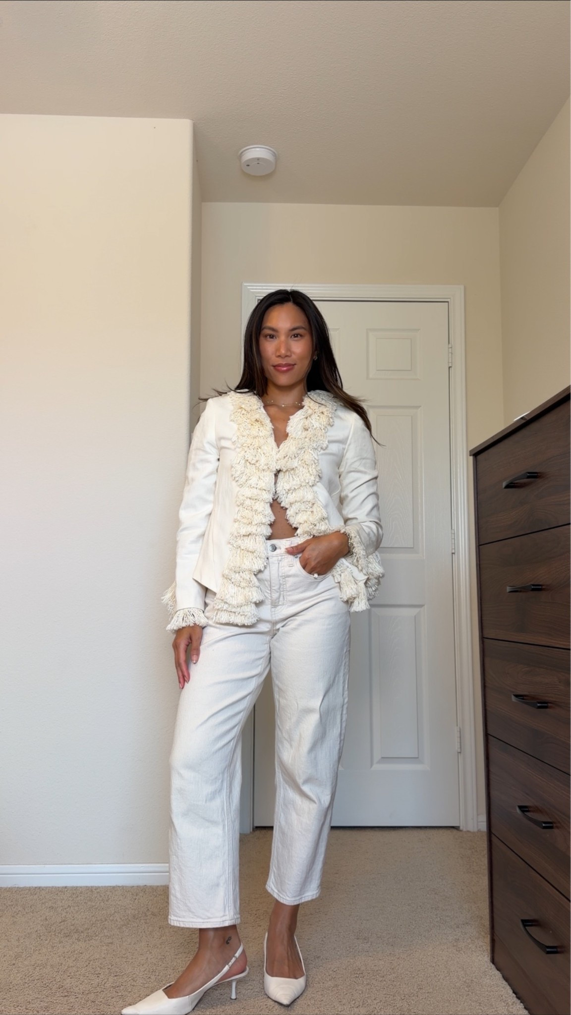 jacket is in an xs and jeans are a size 25 petite