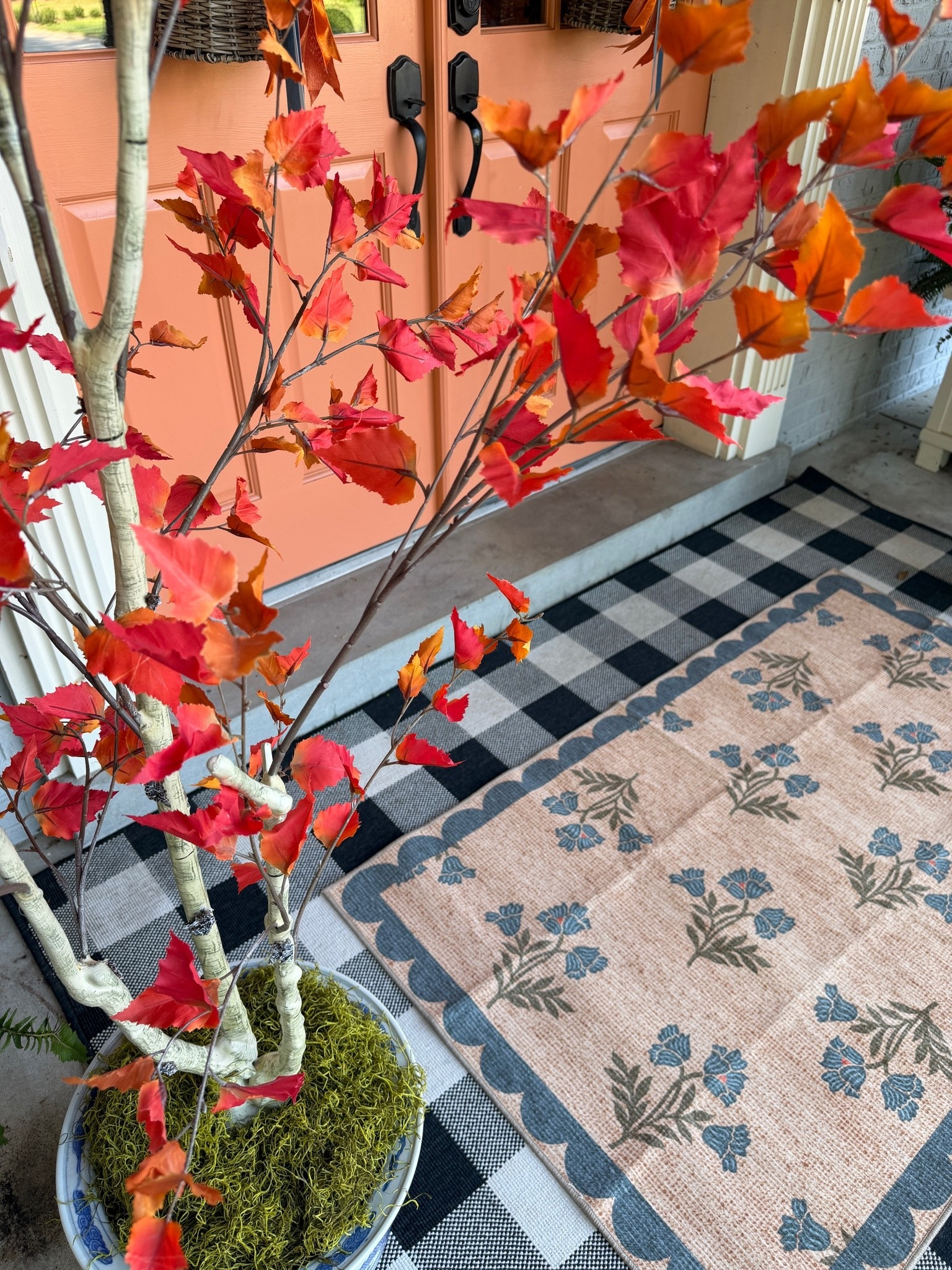 The first little signs of fall have arrived on the front porch! 🍁 I love how these autumn trees instantly add warmth and color—and this scalloped floral rug is such a pretty layer over my favorite checkerboard rug.

I linked all three exact pieces below! 🧡

#LTKSeasonal
