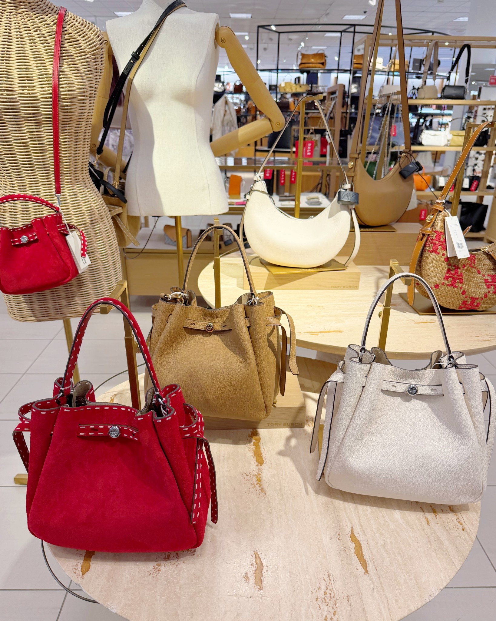 Love this Tory Burch bucket bag style that’s now available in this gorgeous red suede! Lots of other new Tory Burch bags for spring and summer available too including raffia, straw and crochet styles that are perfect for vacation outfits and resort wear. Always love the classic pebbled leather colors for everyday wear, workwear and travel outfits. 

#LTKTravel #LTKOver40 #LTKWorkwear