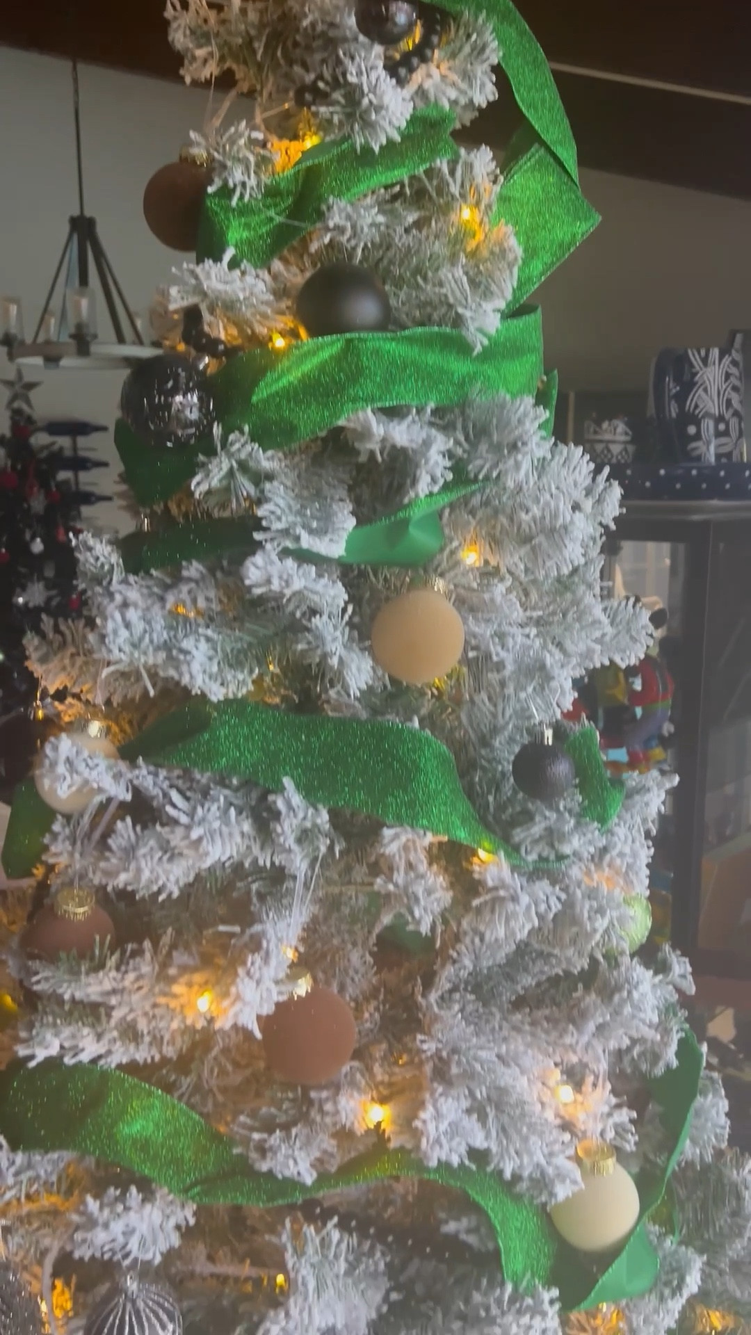 Christmas tree decorations are up. #ribbon #green #christmaslights #star #twinkle #ornaments 

#LTKHoliday #LTKFamily #LTKHome