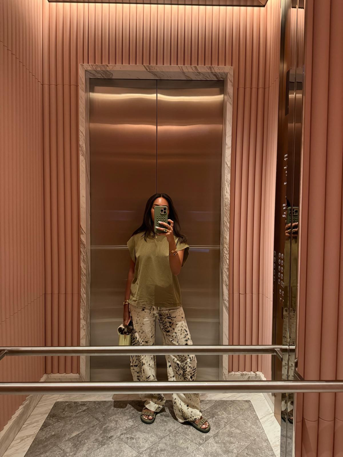 Casual outfit / sleeveless t shirt / Zara top / Zara t shirt / coffee run / holiday outfit / vacation / summer / spring / resort / lioness pants / barrel jeans / euro summer / Dubai / European / baggy / printed jeans  

#LTKspring #LTKuk #LTKsummer