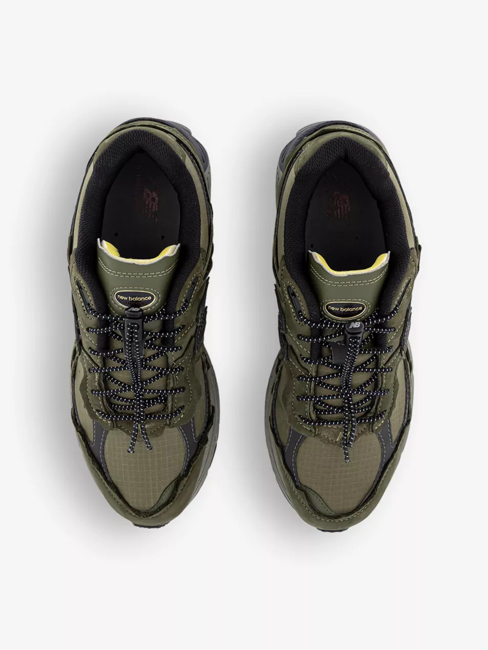 2002 Protection Pack brand-embroidered leather low-top trainers | Selfridges