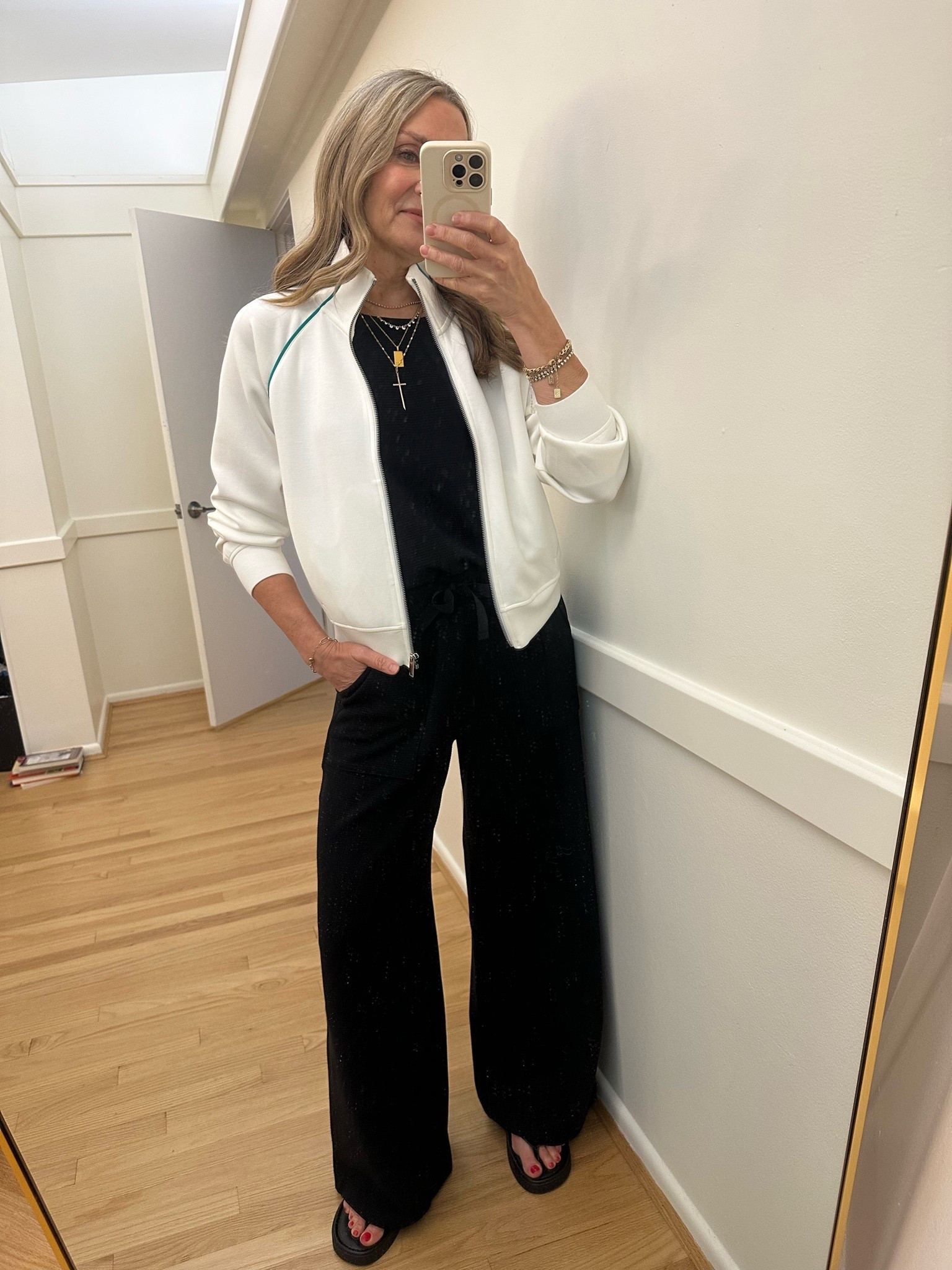 Travel outfit wearing @Spanx AirEssentials track jacket and French rib jumpsuit. Wearing small in both. Code LSWXSPANX for first time orders.

#LTKOver40 #LTKootd #LTKTravel
