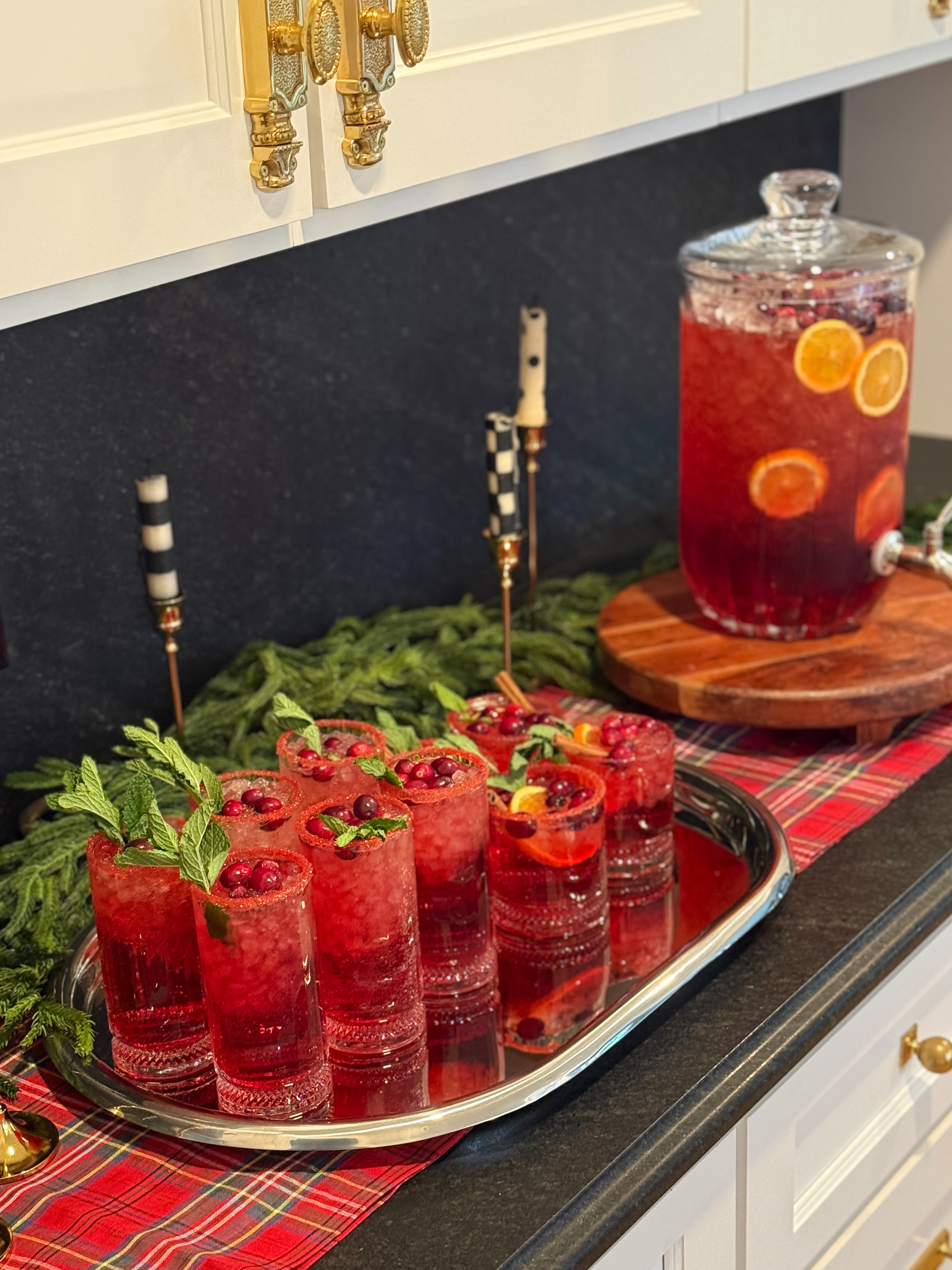 I created a delicious, family-friendly mocktail but the real star is these gorgeous glasses from @cb2. The quality and price point is incredible! I love to add just a couple staples for entertaining each holiday season and these pieces did not disappoint! This year I added the glasses, serving tray and glass drink dispenser – perfect for entertaining season! 

Cranberry Ginger Sparkler Mocktail Recipe

Ingredients:
﻿﻿1/2 cranberry juice
﻿﻿1/2 ginger ale
﻿﻿Splash of lime juice
﻿﻿Fresh cranberries, orange slices, cinnamon stick, mint sprig for garnish

﻿﻿Instructions: 
Fill glass with ice, pour cranberry juice and ginger ale and a splash of lime juice. Stir gently.
Optional: garnish with cranberries, orange slice, cinnamon stick and mint.

#CB2 #CB2Holiday #CB2Partner
 

 #LTKHoliday #LTKfoodie