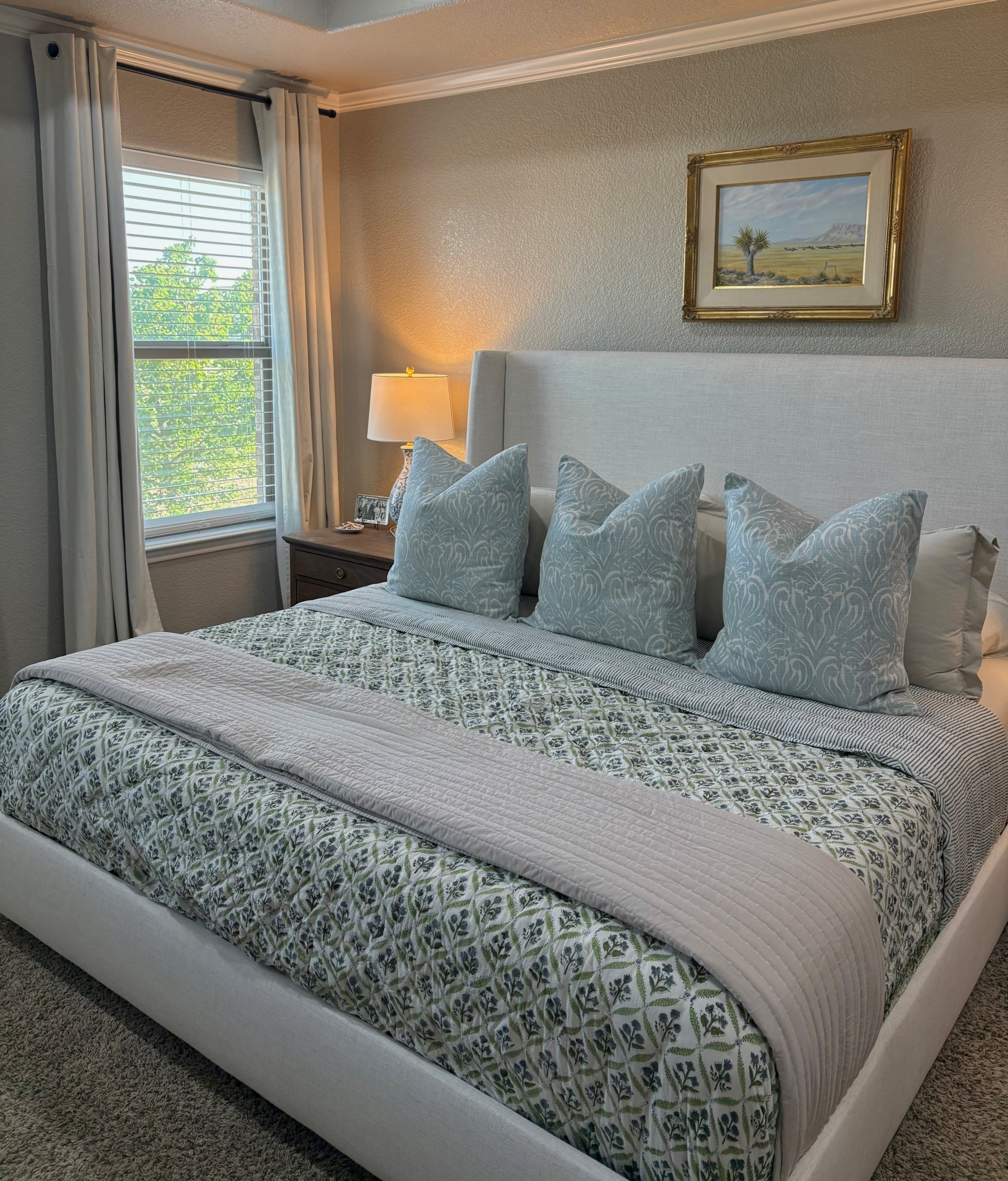 Bedroom details! Bed is king size, color is talc linen. Patterned quilt is 108x108, tan quilt at end of bed is Cal King, pillows are 26” and pillow covers are 24”. Art is an original from ebth.com 
#LTKHome 