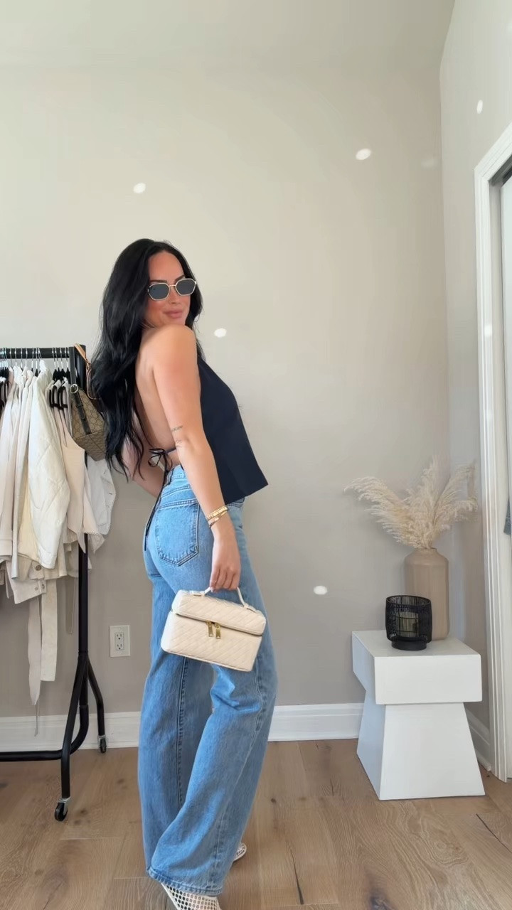 I’m wearing a gorgeous halter backless top paired with my favorite high-rise denim from Aritzia and these feminine crochet flats. Throwing a sweater over your shoulders instantly pulls the whole look together and gives it that effortless, polished look.

This is one of those outfits that’s simple but feels so put together perfect for brunch, coffee dates, or a casual day out. I’ll have everything linked on my LTK for you guys 💙

My sizing 5’7, 145lbs, 32dd
I’m wearing a size small tops, size 27 tall jeans 

@Aritzia spring brunch outfit, brunch outfit ideas, spring outfit inspo, chic spring outfit, effortless outfit, elevated casual, halter top outfit, backless top outfit, high rise denim outfit, aritzia denim, feminine outfit, crochet flats, spring style, casual chic outfit, minimal chic, everyday outfit inspo, neutral outfit, soft feminine style, brunch date outfit, coffee date outfit, easy outfit idea, capsule wardrobe outfit, classic style, polished casual look