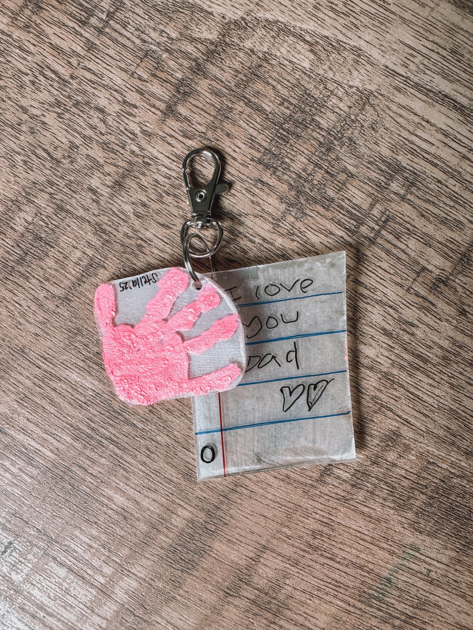personalized Father’s Day gift idea 💕

How to make:
🎨 use acrylic paint for a handprint on shrinky dink paper (or you can have your little one make a drawling) 
✂️ once dry - cut out the shape you want and punch a hole 
📝 make a personalized note with sharpie markers on another piece of shrinky dink paper
🔥 place them both on a baking sheet & bake at 350 for 1-3 minutes 
💡 leave light on in oven to watch them shrink! 
🩵 once cool add a layer of gloss mod podge 
🗝️ add a keychain
 
#personalizedgifts #creatorsearchinsights #giftinspiration #diyideas #FathersDay #fathersdaygiftideas #handmadegifts #handmade #creativegifts 

#LTKGiftGuide #LTKFamily #LTKKids