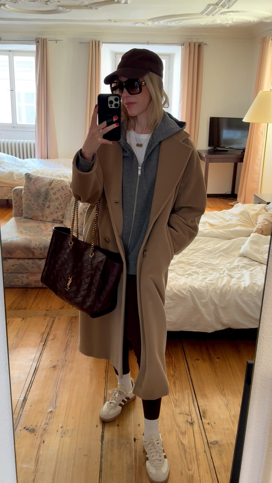 Travel look of the day, airport outfit, European vacation, camel coat, @Zara hoodie, Amazon chocolate brown leggings, Adidas Samba sneakers, burgundy YSL tote bag

#LTKdayinmylife #LTKootd #LTKTravel