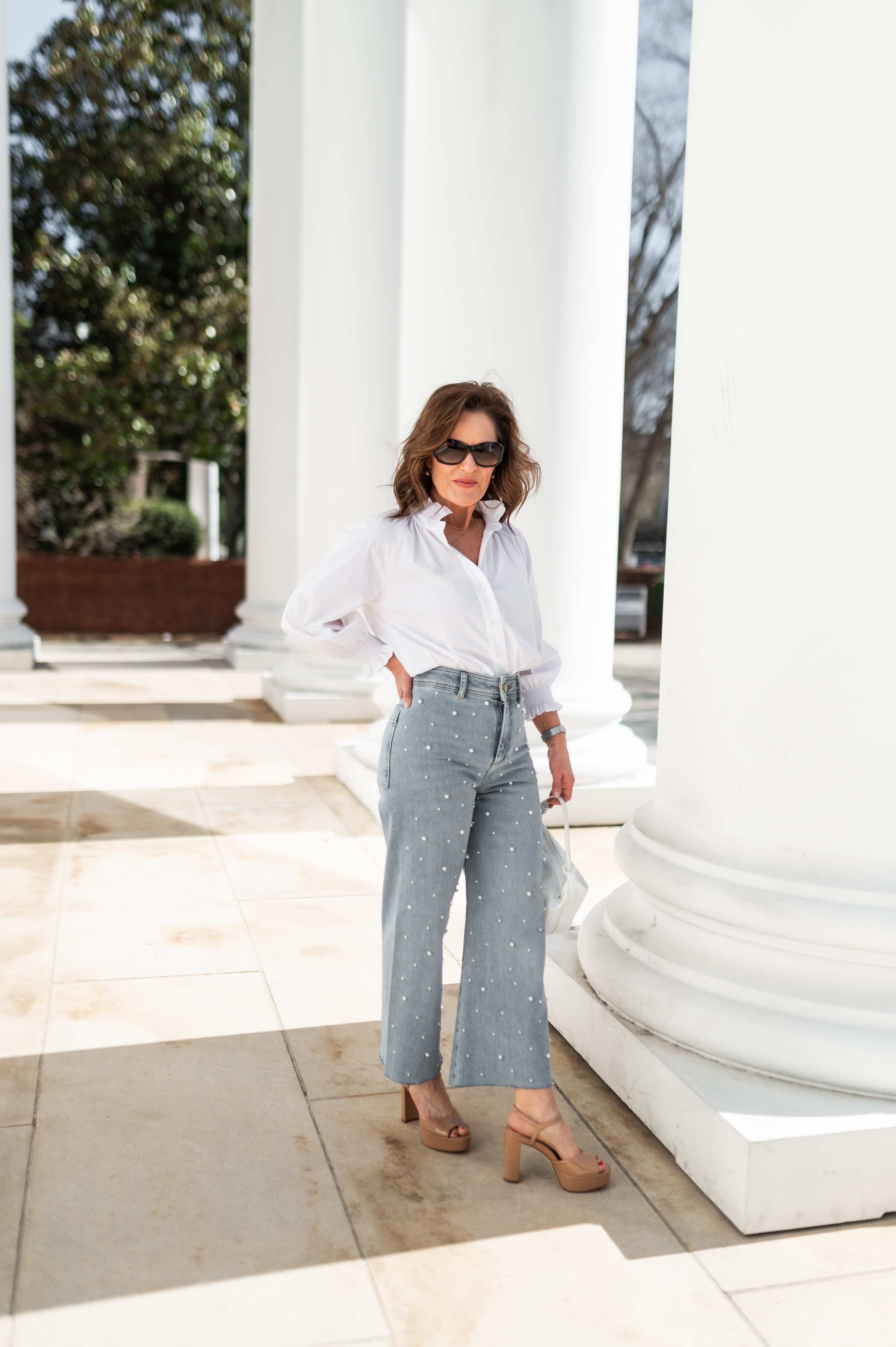 These jeans are a must for the season for all the pearl lovers.  They are petite-friendly since they are cropped.  So fun to wear for a date night out or casually with sneakers.  Run TTS, wearing a size 2.

Crisp white blouse pairs beutifully with the embellished jeans and platform sandals from Inez.  Use code BETH15SPRING25 for 15% off. 

 

#LTKOver40 #LTKPetite #LTKShoeCrush