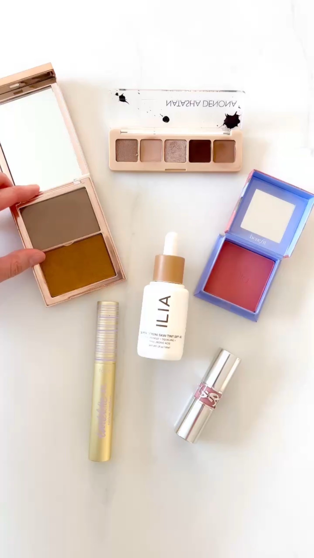 In my makeup bag: Currently using these beauty products at home and ‘on-the-go’. Love them! 💕
Mini review:
1. Patrick Ta Crème contour & powder bronzer duo (color in photo looks more yellow than product irl) - see/try it, so flattering and convenient as a duo!
2. Natasha Denona Eyeshadow mini palette - a nice range of shades that is great for travel as well!❤️
3. Benefit blush - for a natural looking flush that’s easy to blend
4. Tarte tubing mascara - a lengthening mascara that doesn’t smudge 😍
5. Ilia serum skin tint with SPF - under foundation or on its own, love that it is hydrating while providing sun protection!😎
6. YSL lip balm - looks and feels luxuriously hydrating, great for touchups throughout the day ❤️

Makeup faves, skincare, toilette bag, must haves 

#LTKOver40 #LTKBeauty #LTKFindsUnder50