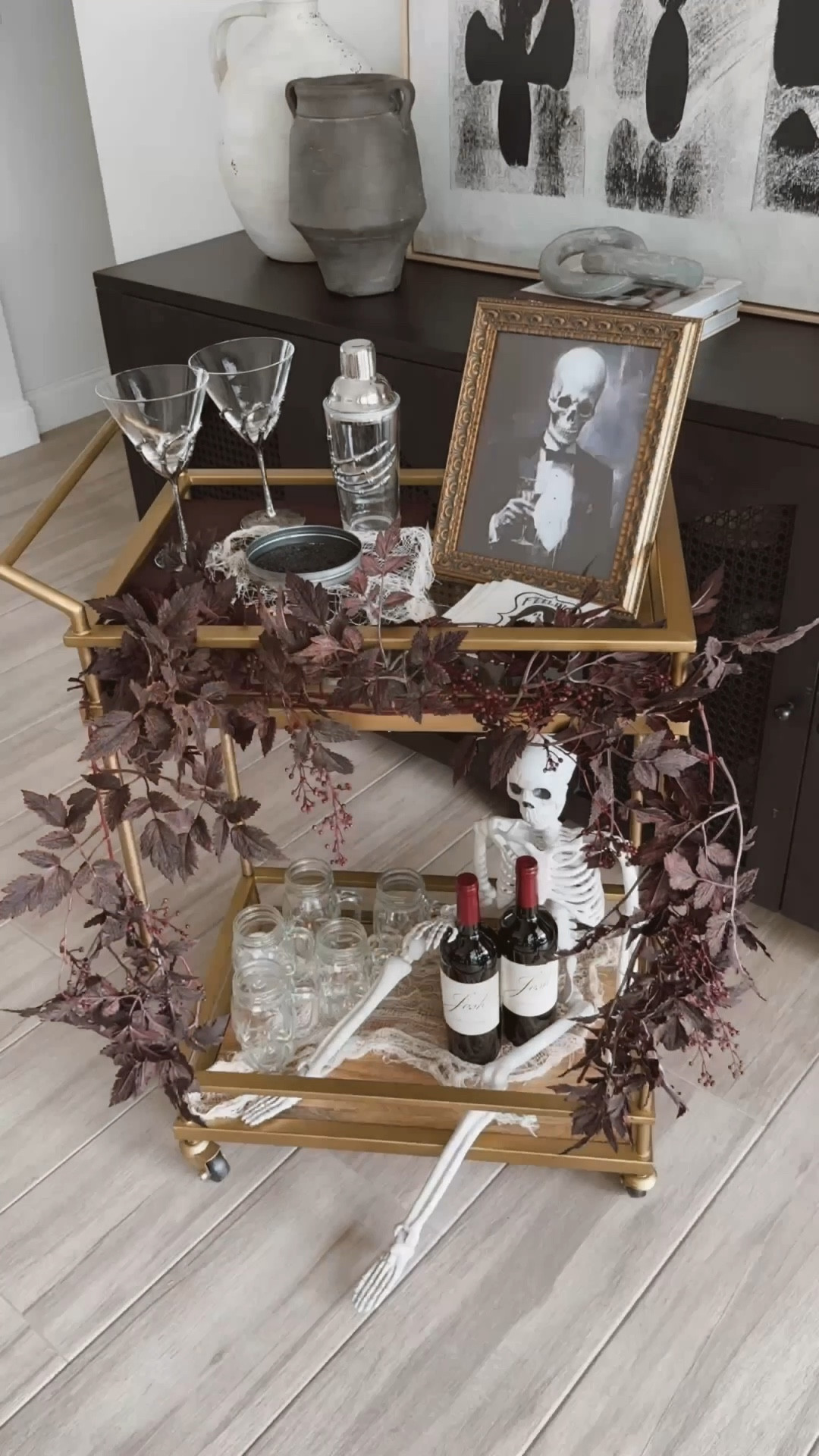 Halloween bar cart 💀 #halloweenbarcart #halloween #halloweendecor #homedecor #halloweenparty #skeleton #cocktails 

#LTKhome #LTKfindsunder50 #LTKHalloween