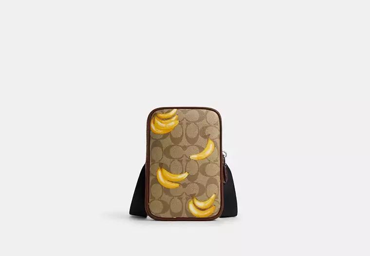 Aden Crossbody In Signature Canvas With Banana Print | Coach Outlet