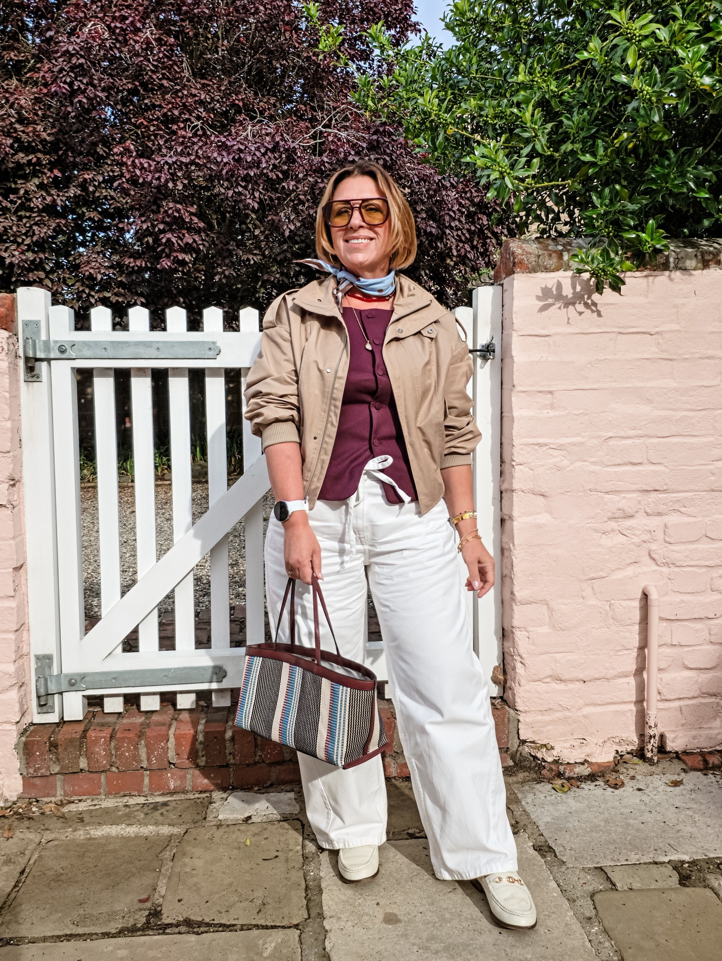 Burgundy waistcoat styled with beige, white and a pop of blue

#LTKsummer #LTKover50style #LTKpetite