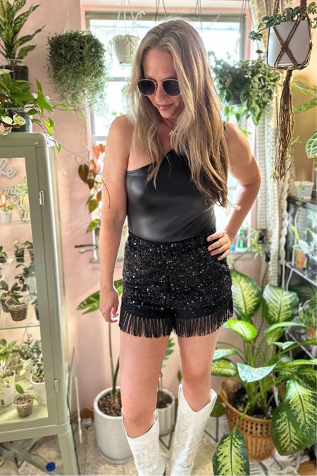 Country concert outfit, Nashville outfit, sequin shorts, faux leather bodysuit, white cowboy boots, affordable fashion 

#LTKfindsunder50 #LTKstyletip #LTKFestival