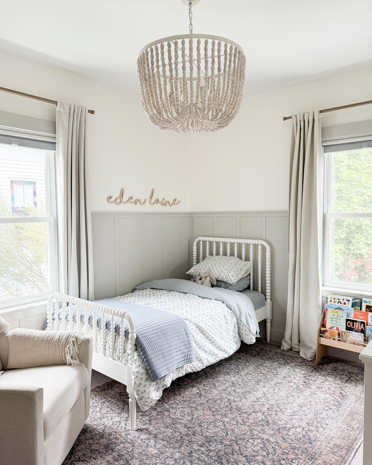 Girls bedroom, big girl bed, white jenny Lind bed. Blue and white floral bedding, gingham sheets. Little girls room, toddler girl room. Neutral girls room.

#LTKHome #LTKKids