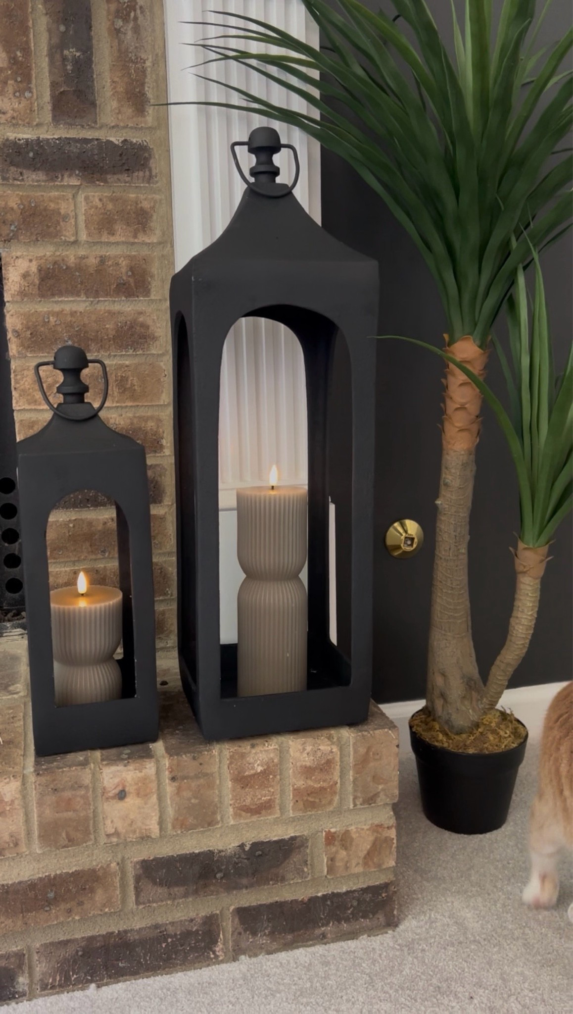 I ran to Homesense and I found these Rachel Zoe’s lantern set and I immediate fell in love with them. They matched my fireplace aesthetic and the wall scones from Z Gallery. The battery operated candles fit perfectly in there as well.

#LTKHome