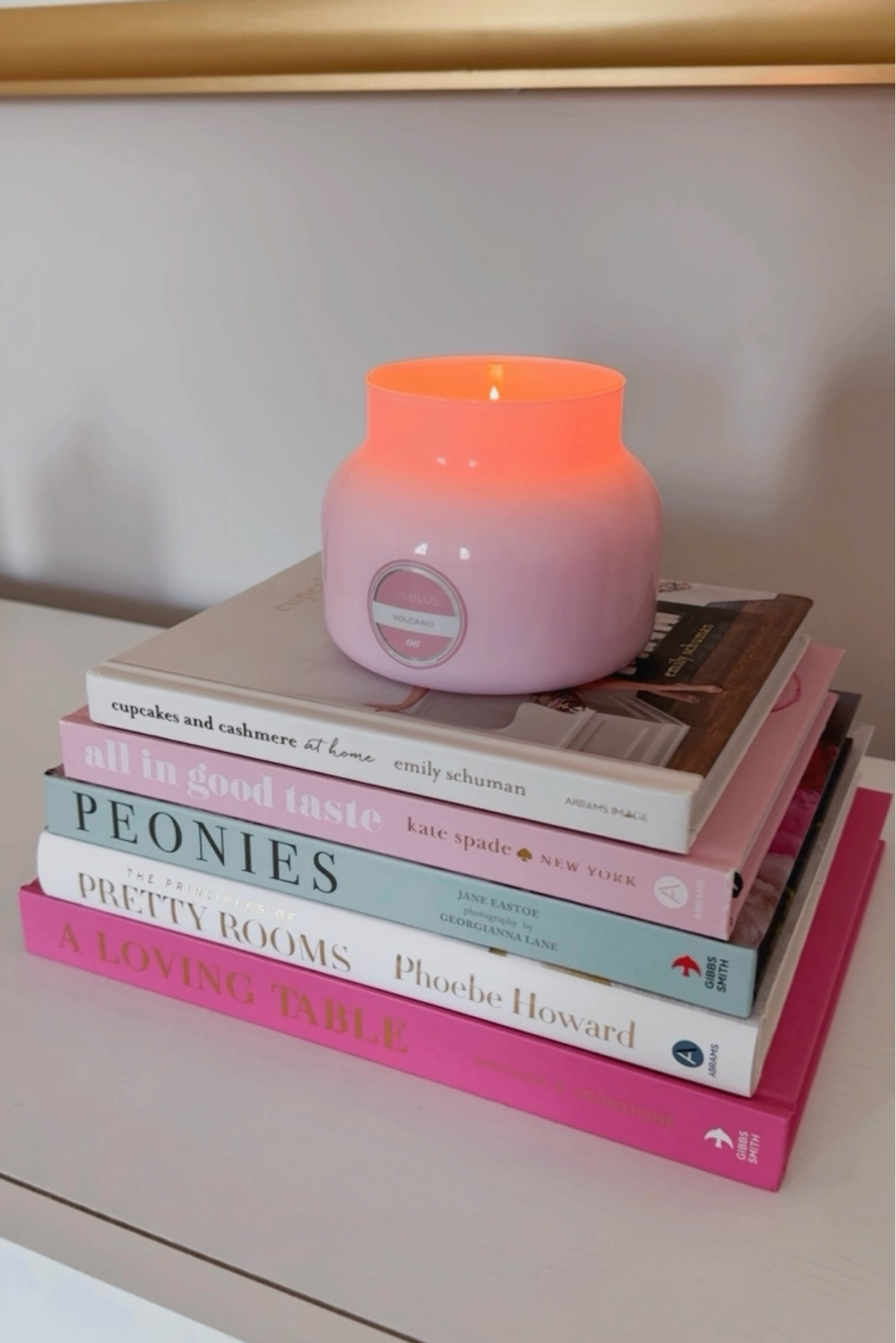 Home decor books / coffee table books / pretty pink decor / pink decor / cupcakes and cashmere /  Kate spade book / home decor / capri blue candle /  

#LTKhome #LTKfindsunder100 #LTKfindsunder50