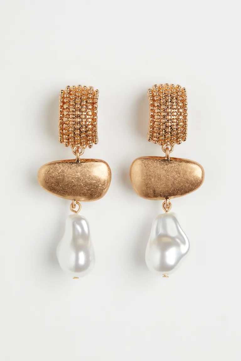 New ArrivalA pair of metal earrings with a textured top, oval-shaped pendants and pearly plastic ... | H&M (US + CA)