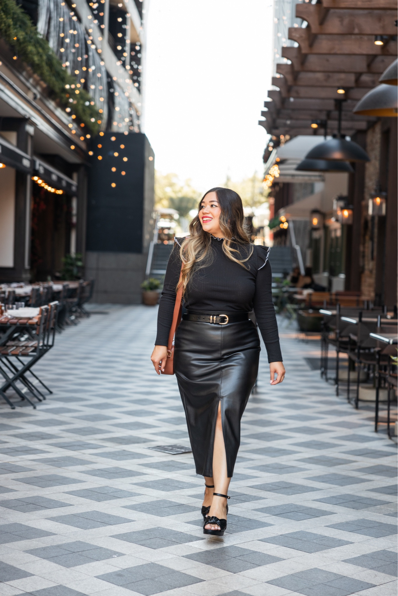 Pointelle Ribbed Ruffle Top - wearing large
Faux Leather Front Slit Midi Skirt - wearing size 10

fall outfits, loft haul, loft outfit, loft fashion, loft outfits, fall wedding guest outfit, teacher outfits, fall skirts, country concert outfit, work outfit, midi skirt, faux leather skirt, fall family photoshoot outfit, fall outfit, fall skirt, Nashville outfit, mock neck top, mock neck turtleneck top, gold buckle belt, black belt, bow heels, faux leather heels, knot heels, knot platform heels, camel camera bag, brown camera bag 

#LTKSeasonal #LTKmidsize #LTKsalealert