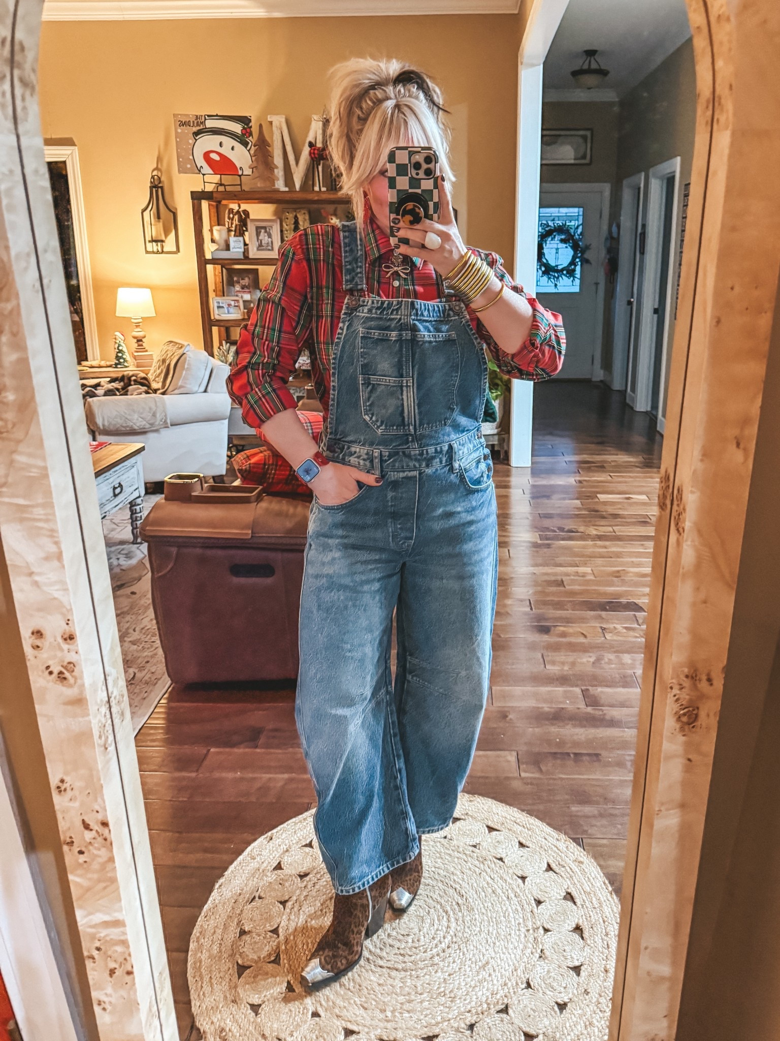 My fav denim overalls and mens plaid button up. I’m wearing a medium in overalls and a large in the mens shirt. My boots run true to size  
♥️ Save with my code MANDIE on watchband 

#LTKootd #LTKOver40 #LTKHoliday