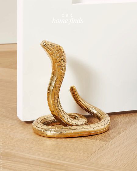  Cutest snake door stop or bookend from cb2 . Great for Halloween or year round 

Cb2 Halloween. LTK Halloween. Wyatt modern brass doorstop or bookend brass 

#LTKhome #LTKFind #LTKSeasonal