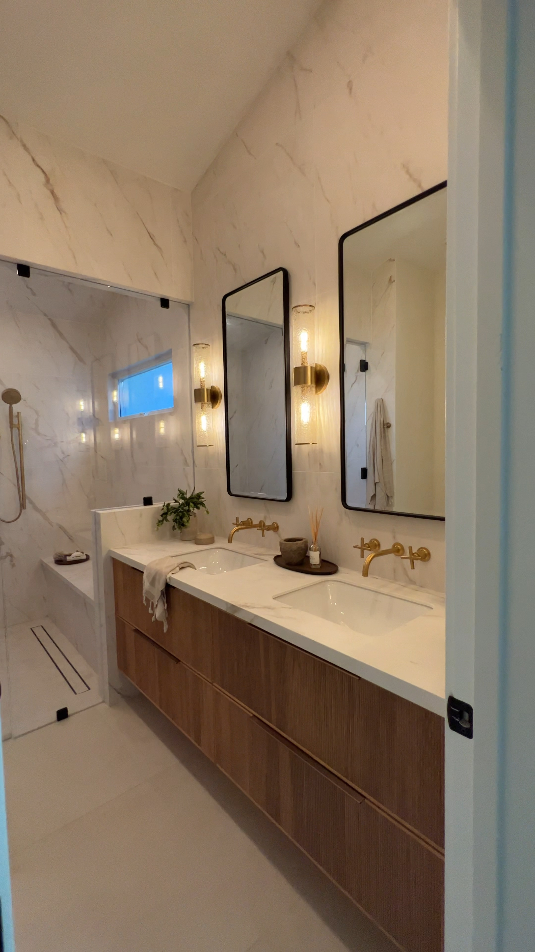 I've had lots of requests from people to recreate this bathroom because it's such an affordable look to achieve this high end design. These are large format tiles and give such a huge impact to a bathroom.
Also linked similar looks for less options for the other finishes.

#LTKSaleAlert #LTKHome #LTKFindsUnder100