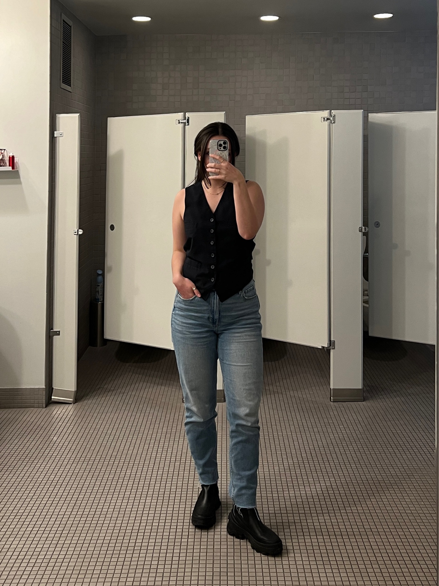 Women’s black vest, button up, medium wash jeans, straight leg jeans, black combat books, gold jewelry 

#LTKstyletip #LTKfindsunder50 #LTKSeasonal