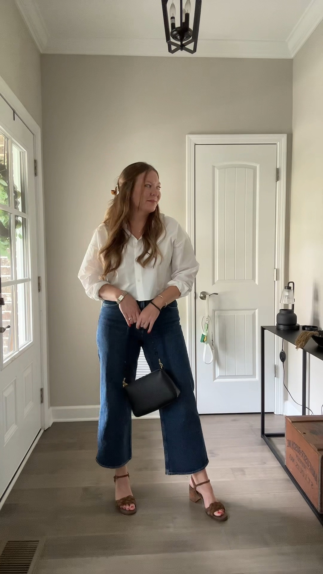 Cropped white button down / tts wearing a medium 
Wide leg dark wash ankle jeans / tts wearing a 29
Brown sandal heels / tts
Two tone watch 
David Yurman ring and cuff 
Evil eye necklace 
Small diamond hoop Huggies earrings 

#LTKWorkwear #LTKdayinmylife #LTKootd