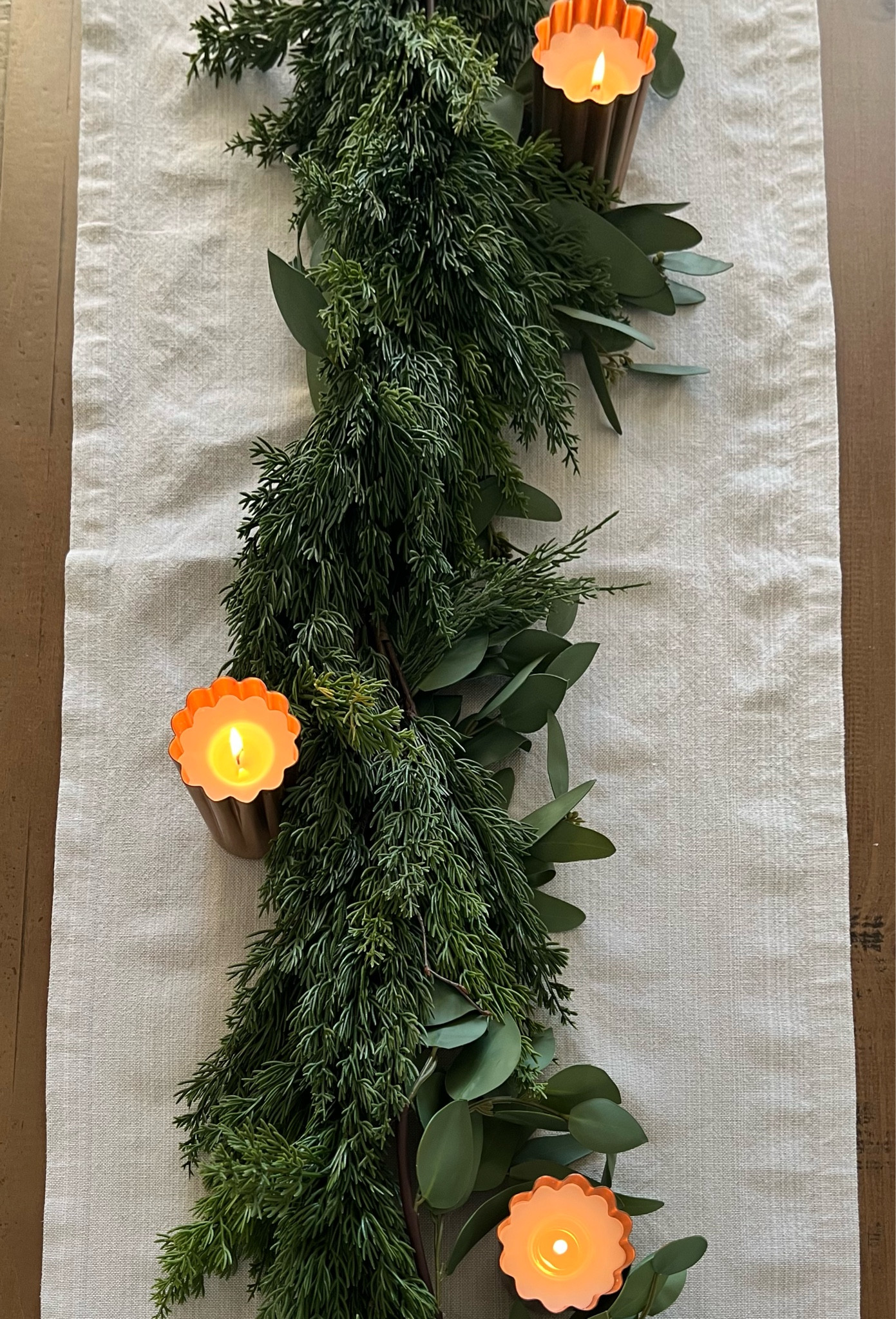 This 6 ft real-touch cypress garland is on clearance! To achieve a full look, I twisted  eucalyptus and cypress garlands together using greenery ties to keep them together. You can also add some battery operated twinkle lights  

Garland / Christmas / table decor / table runner / linen table / candles / hearth and hand / crate and barrel / amazon home / eucalyptus garland / garland ties 

#LTKHome #LTKHoliday #LTKFindsUnder100