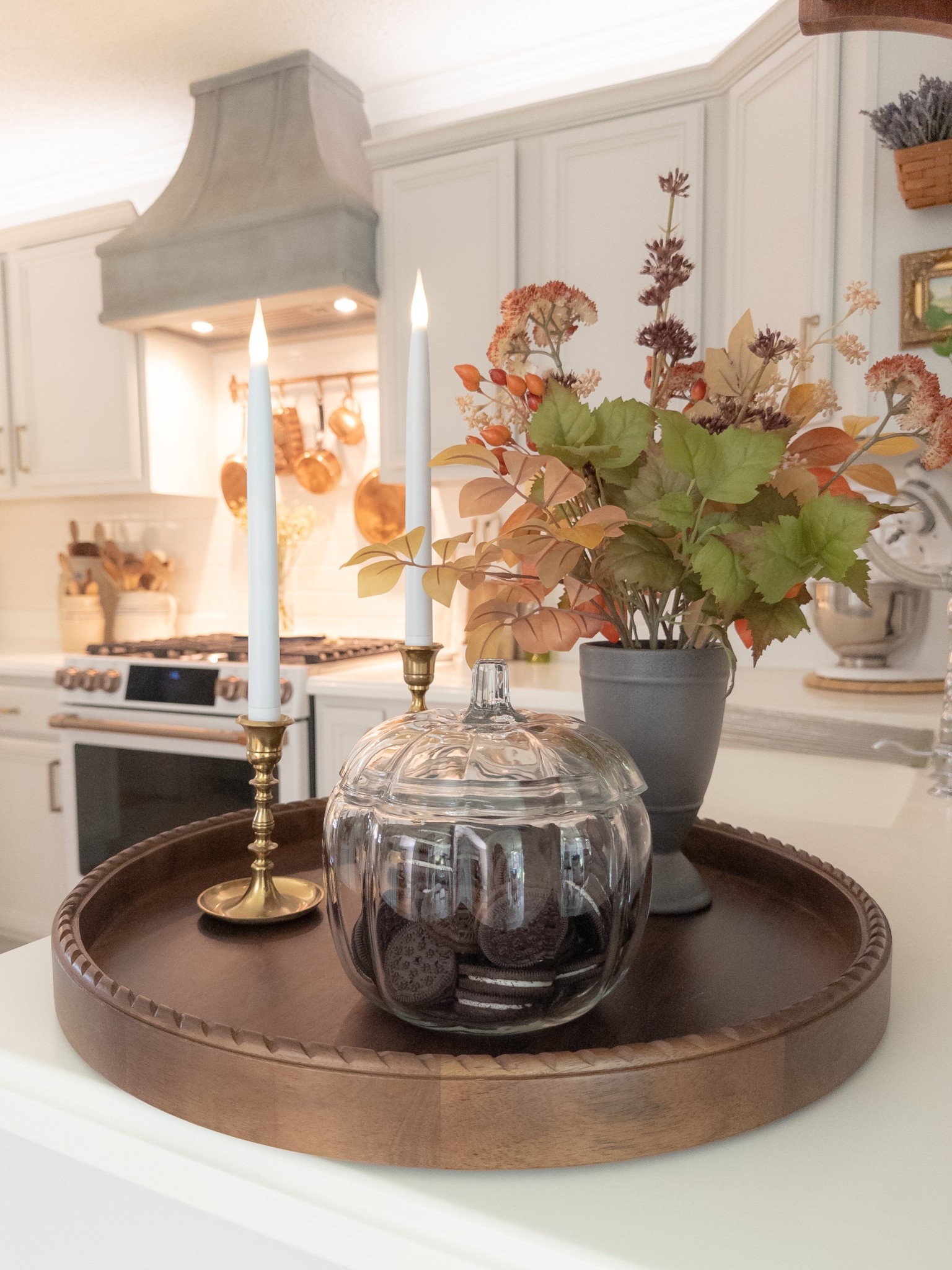 Cozy up your home this season with an easy autumn tray styling idea! I used a beautiful Target Studio McGee wood tray from target as the base then layered and simple elements for warmth thing charm.  Fall stems, candles and glass pumpkin cookie jar.
Perfect for stalling, your coffee table, entryway, or kitchen counter.

#LTKSeasonal #LTKHome
