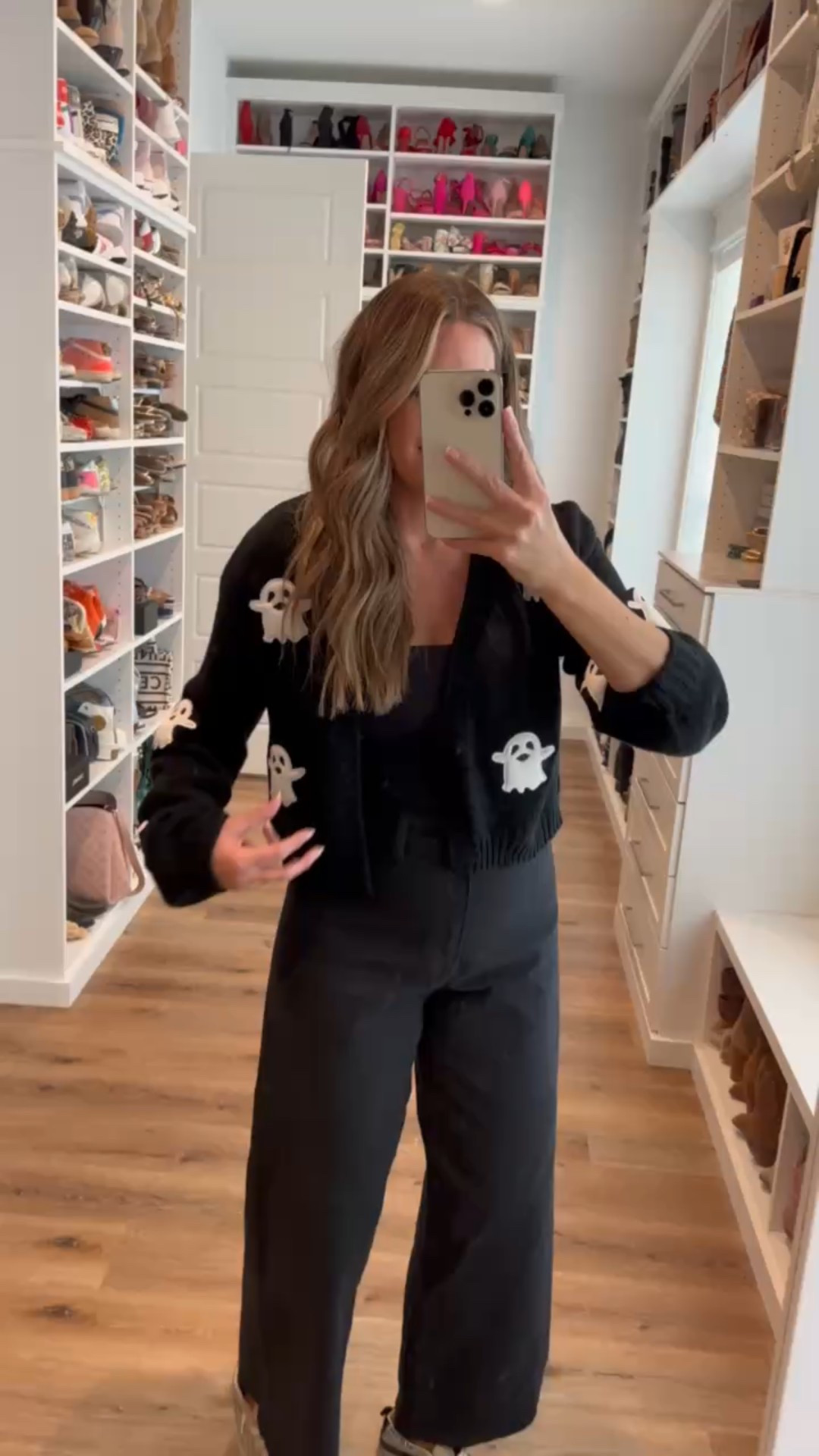 Amazon wins again! Budget-friendly Halloween outfits that are comfortable, mom-friendly, and perfect for a class party. Cute, fun, and stress-free. Exactly what we need this season!  In a medium Halloween cardigan, size 8 wide leg cropped black jeans, sneakers and accessories- fits tts. shop dandy, halloween, lounge wear, fall outfit, fall lounge, amazon fashion

#LTKFindsUnder50 #LTKSeasonal #LTKStyleTip